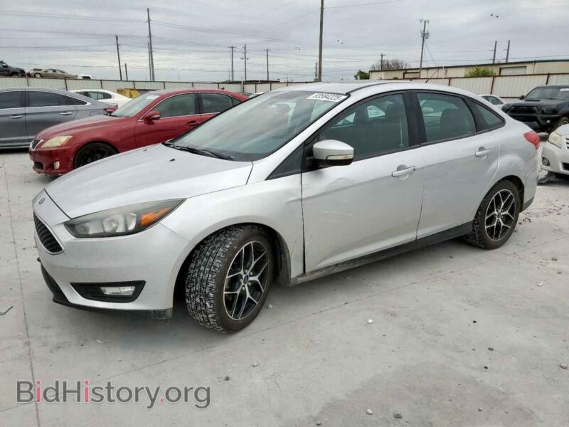 2017 Ford FOCUS SEL (VIN 1FADP3H24HL303206) — фото 1 из 12, Copart, повреждение: бок