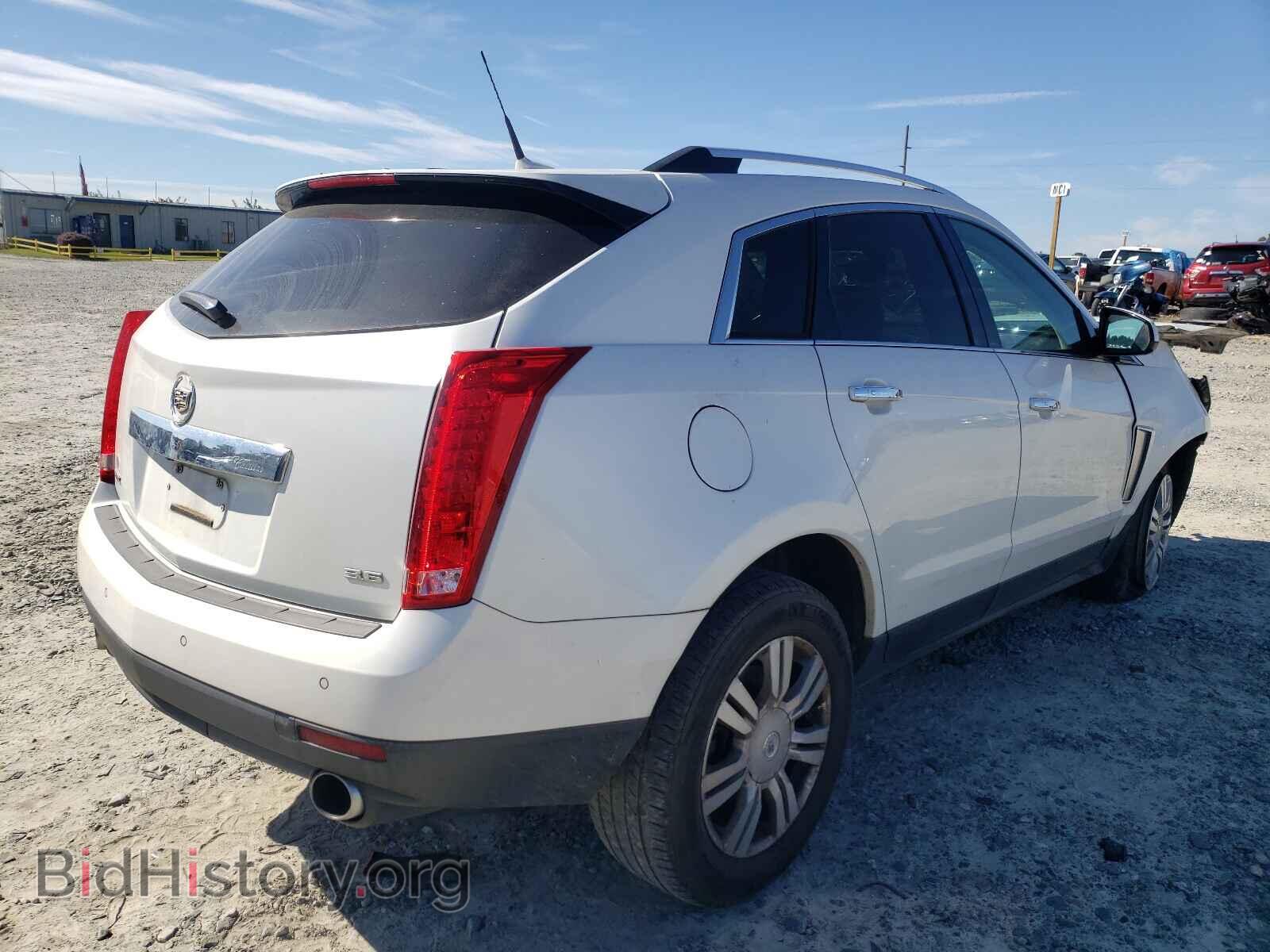 2013 CADILLAC SRX - VIN: 3GYFNCE35DS529646 - Фото 4