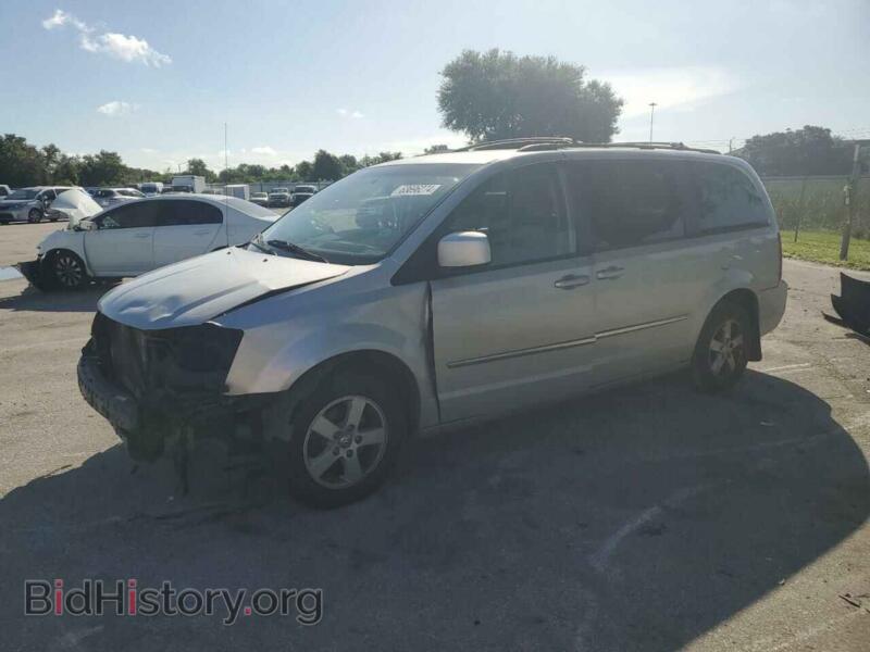 2010 Dodge CARAVAN SXT (VIN 2D4RN5D17AR139576) — photo 1 of 14, Copart, damage: front end