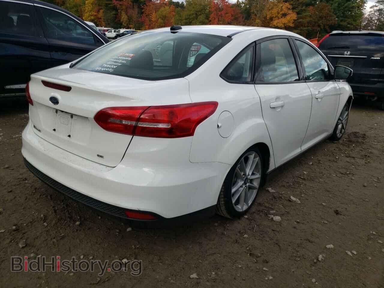 2016 FORD FOCUS - VIN: 1FADP3F21GL303956 - Photo 4