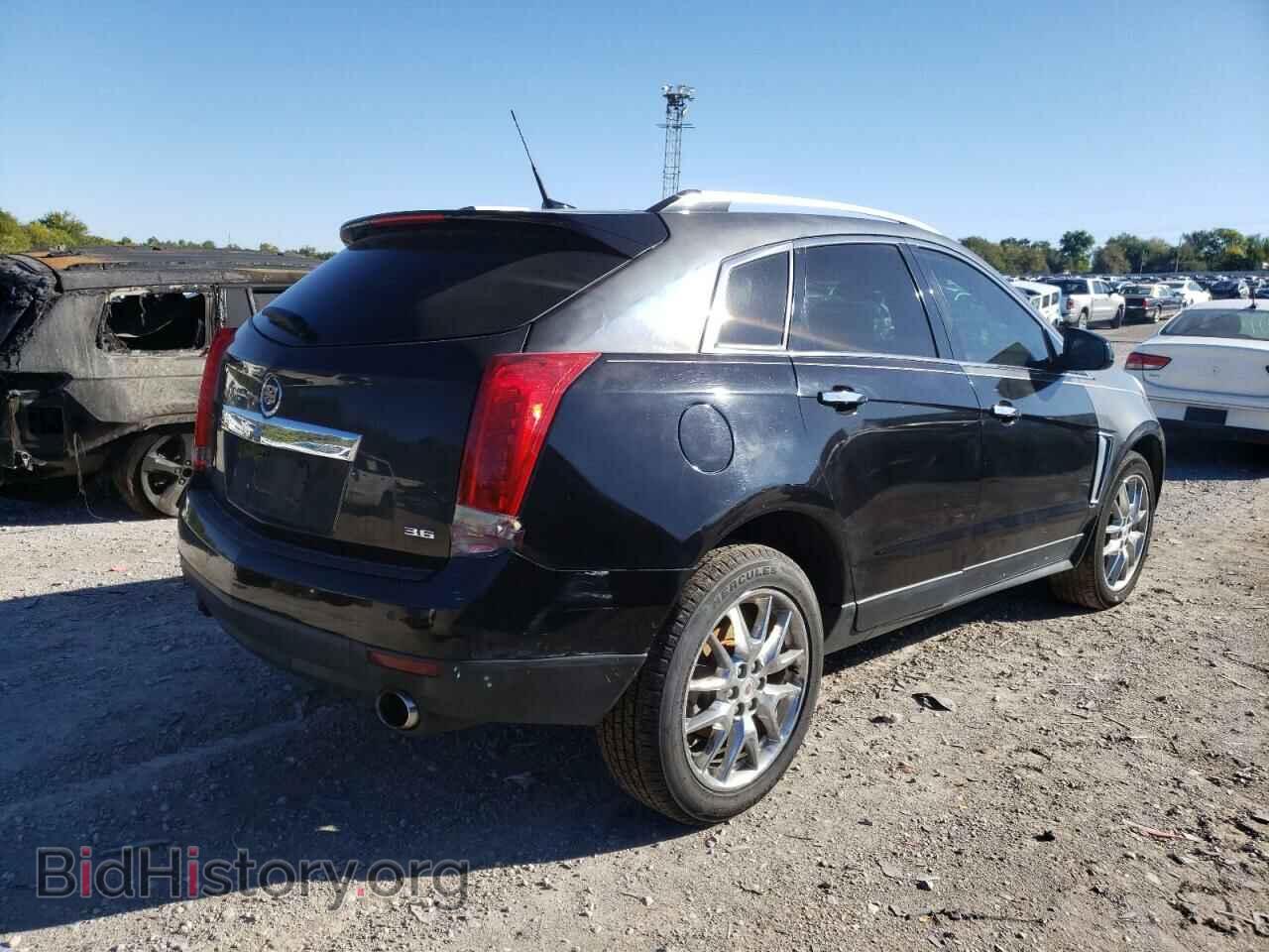 2014 CADILLAC SRX - VIN: 3GYFNDE34ES528043 - Photo 4