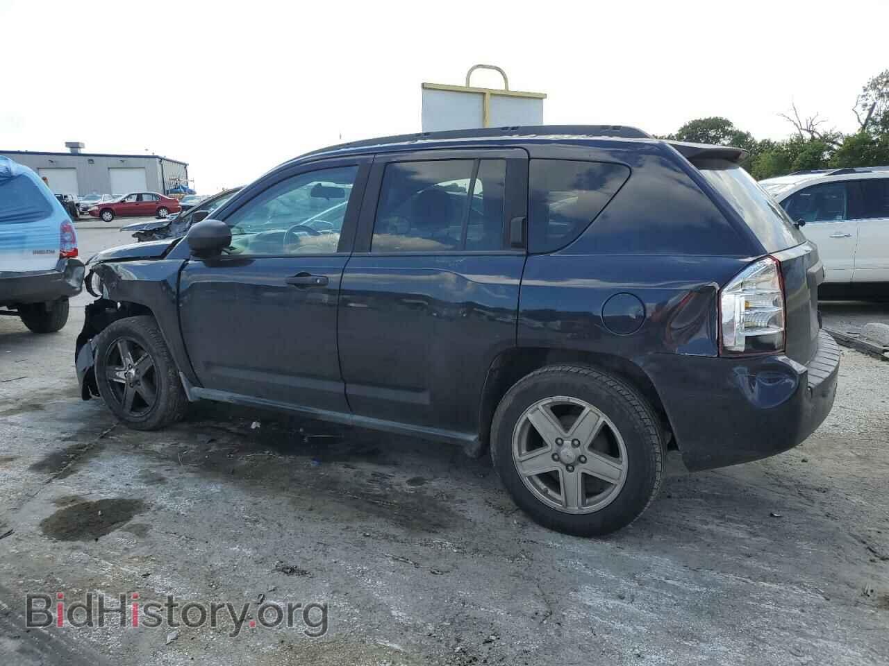 2010 JEEP COMPASS - VIN: 1J4NT1FB0AD659003 - Photo 2