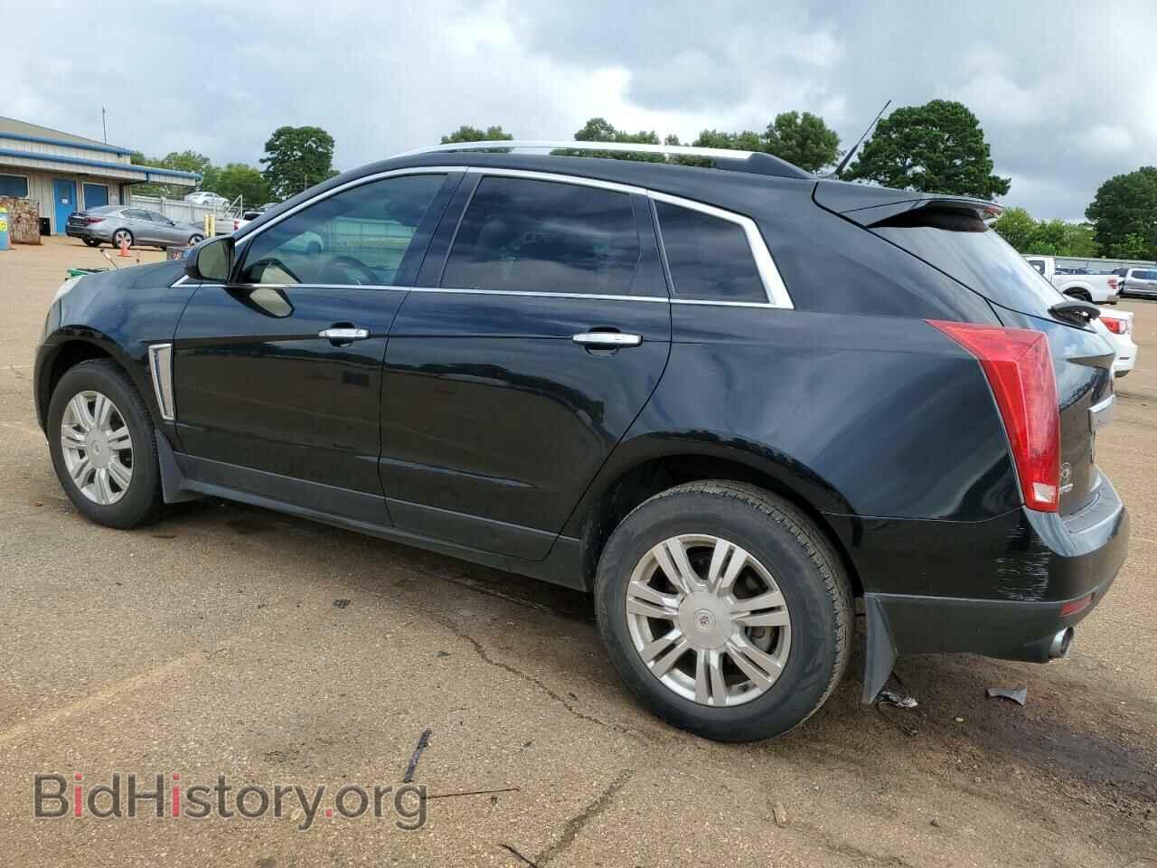2013 CADILLAC SRX - VIN: 3GYFNCE39DS523879 - Фото 2