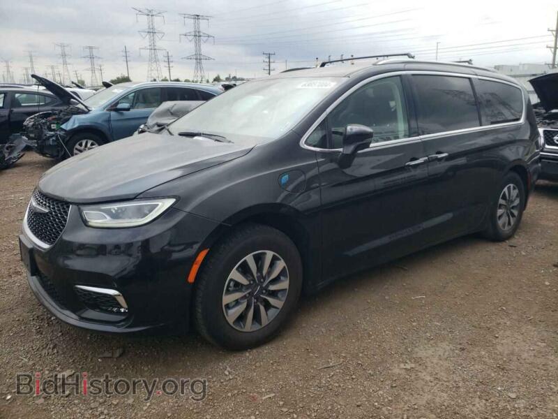 2021 Chrysler PACIFICA Hybrid Touring L (VIN 2C4RC1L71MR576897) — photo 1 of 14, Copart, damage: side