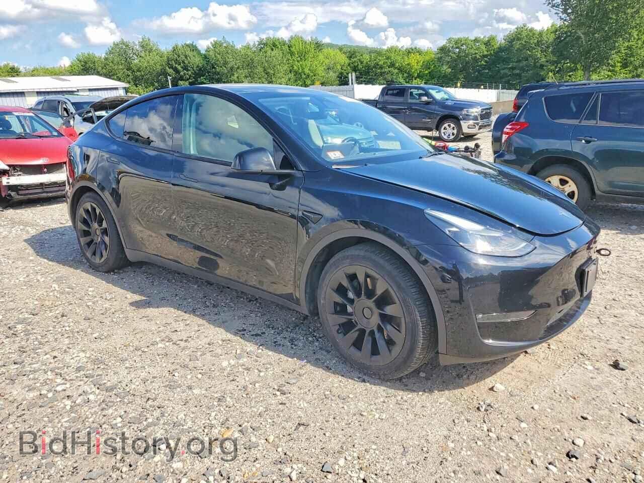 2023 TESLA MODEL Y - VIN: 7SAYGAEE6PF769013 - Photo 4