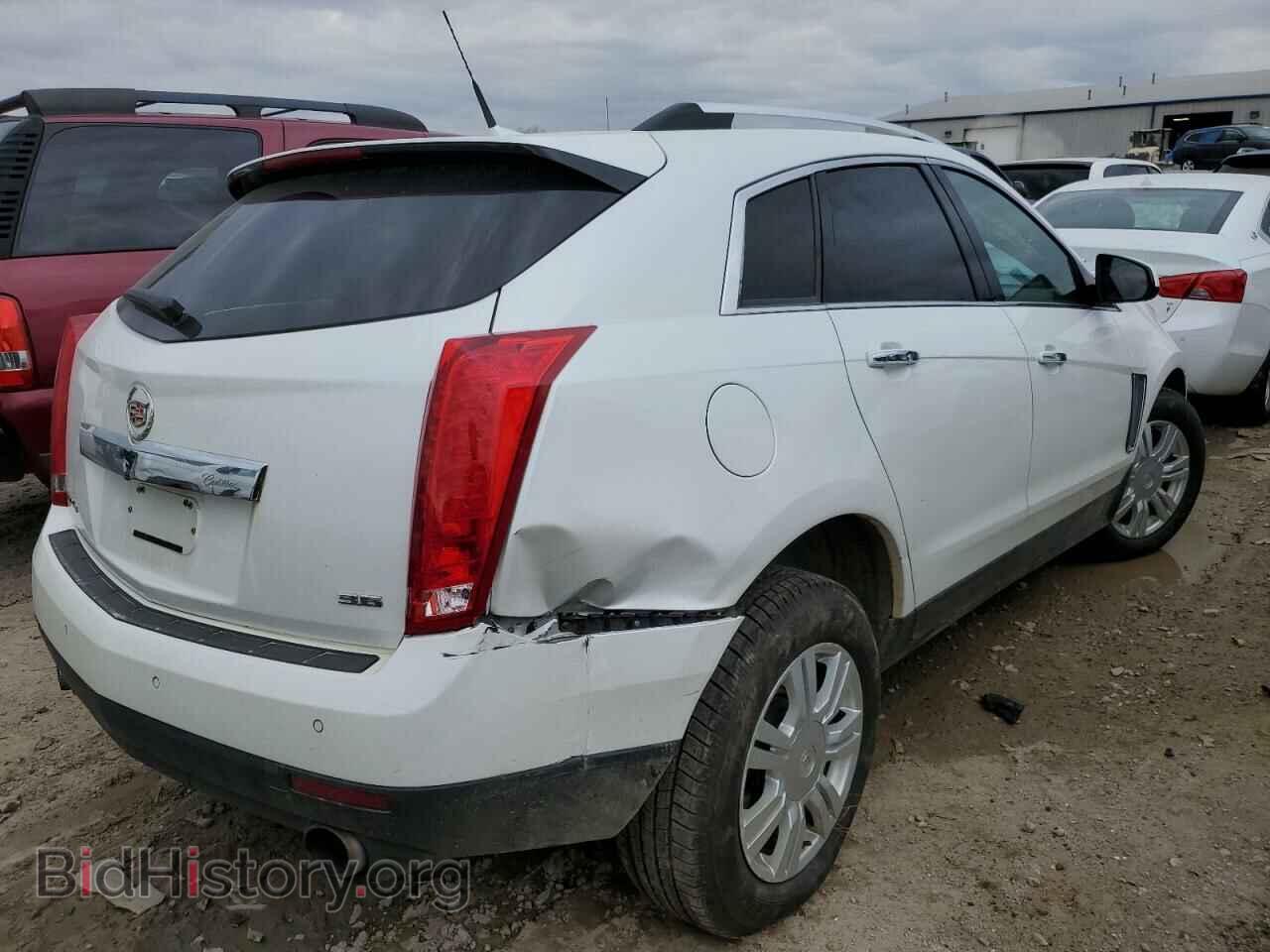 2014 CADILLAC SRX - VIN: 3GYFNEE37ES541472 - Фото 4