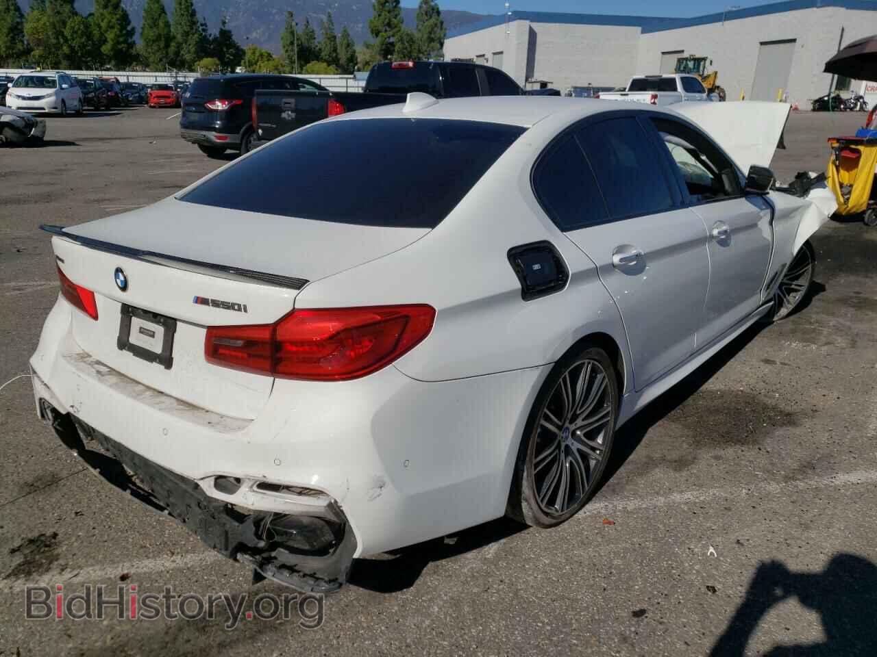 2018 BMW M5 - VIN: WBAJB9C57JB034711 - Фото 4