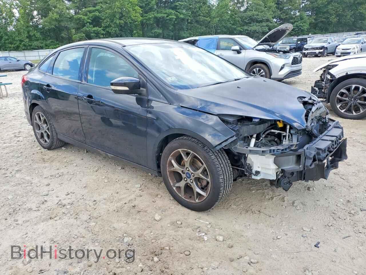 2014 FORD FOCUS - VIN: 1FADP3F24EL386084 - Photo 4