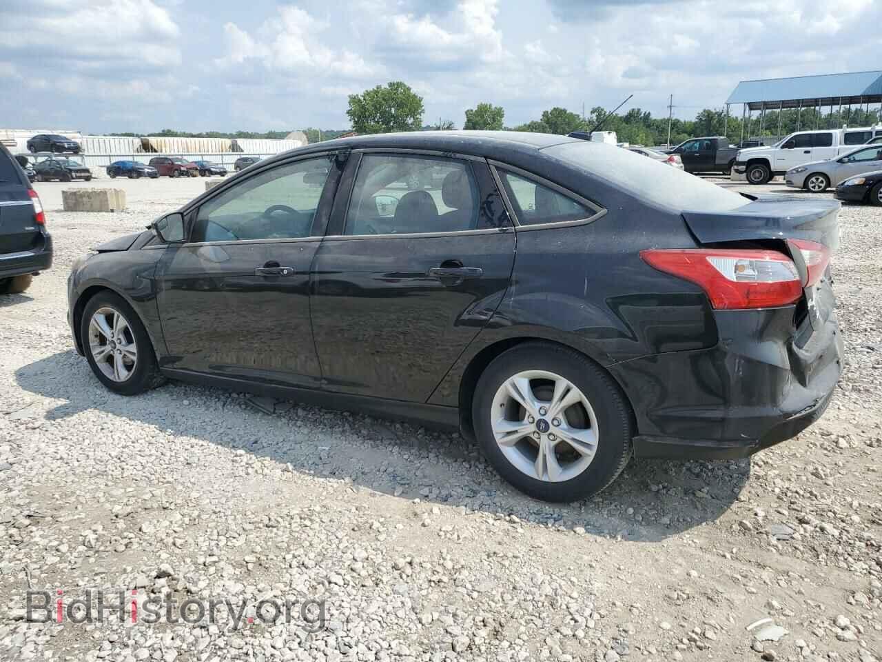 2014 FORD FOCUS - VIN: 1FADP3F21EL390450 - Photo 2