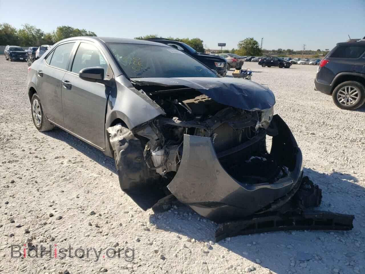 Фотография 5YFBURHEXEP097304 - TOYOTA COROLLA 2014