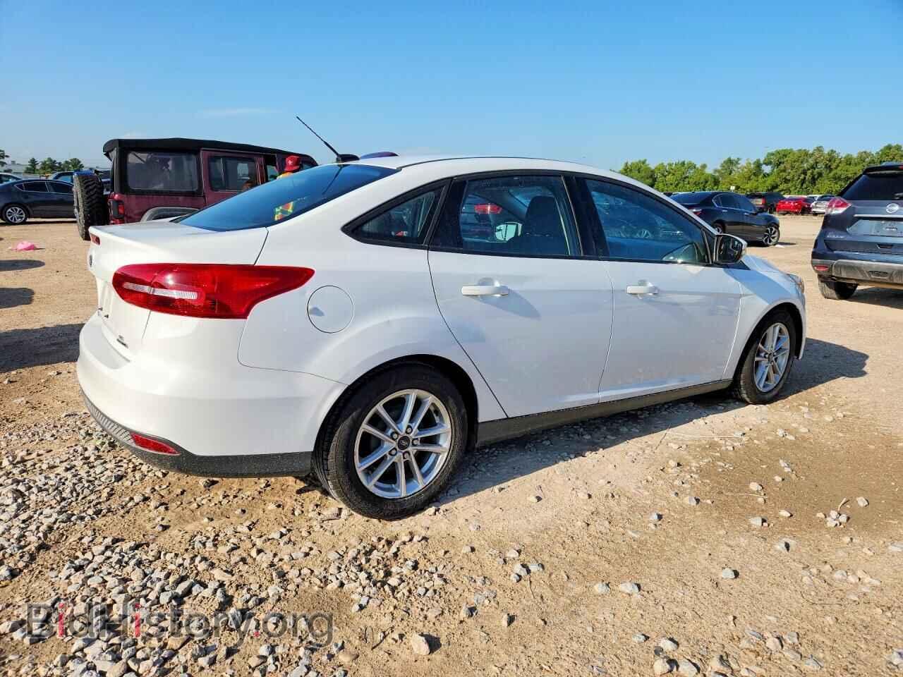 2016 FORD FOCUS - VIN: 1FADP3F27GL391234 - Photo 4