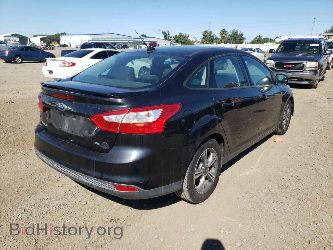 2014 FORD FOCUS - VIN: 1FADP3F29EL454007 - Photo 4