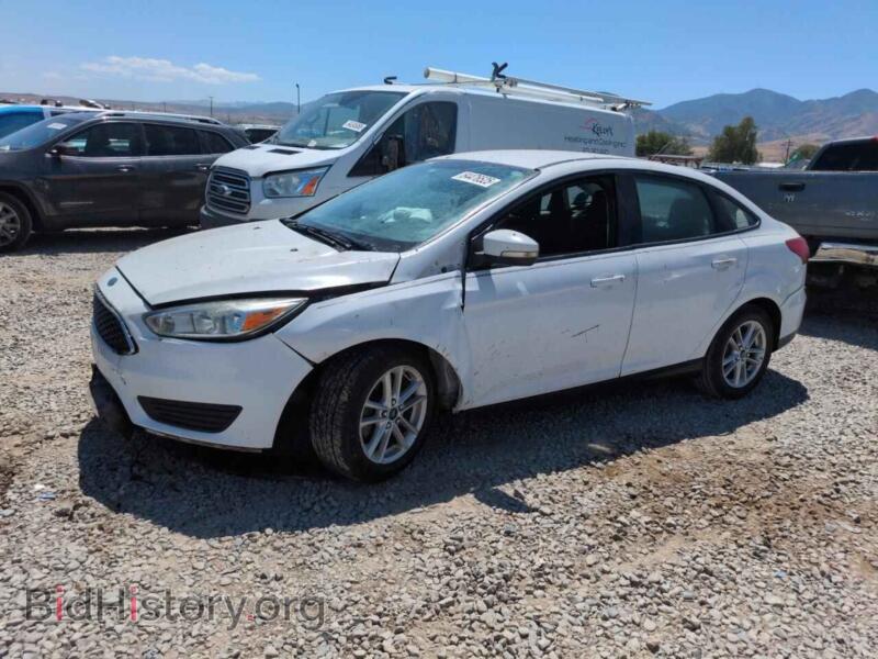 2015 Ford FOCUS SE (VIN 1FADP3F22FL262929) — фото 1 из 12, Copart, повреждение: передняя часть