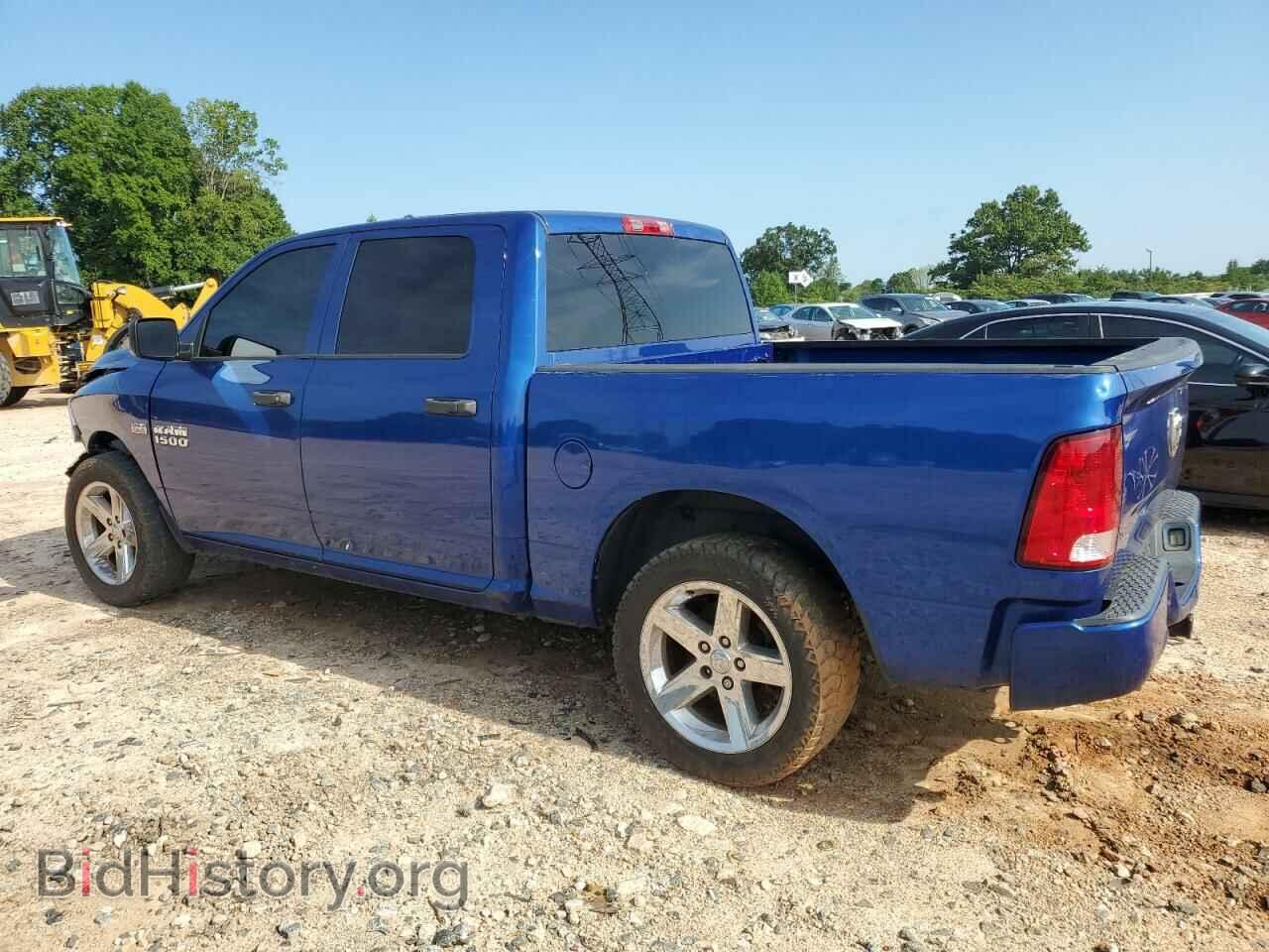 2014 RAM 1500 - VIN: 3C6RR6KTXEG234020 - Фото 2