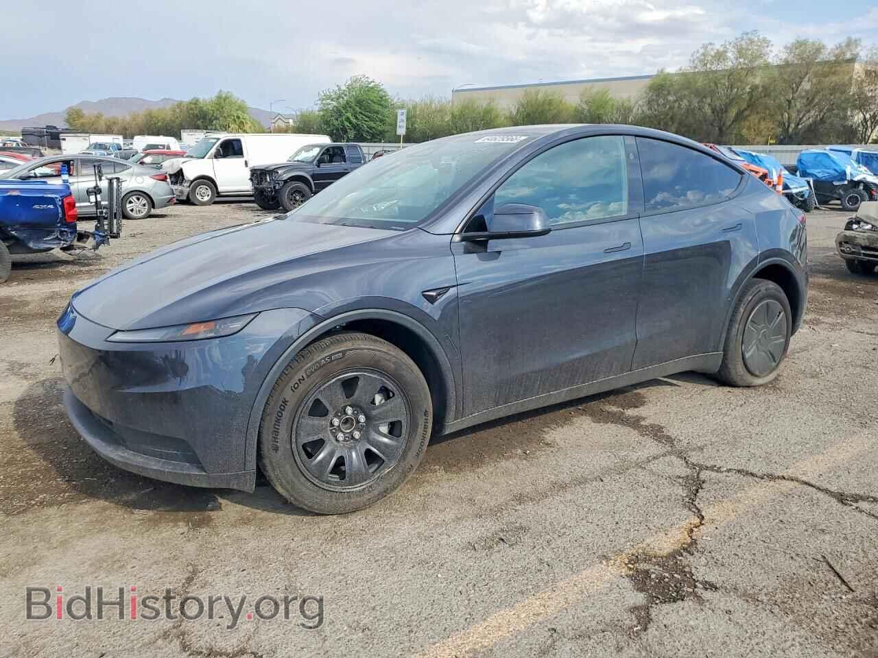 2026 Tesla MODEL Y (VIN 7SAYGDEDXTA720915) — photo 1 of 14, Copart, damage: front end