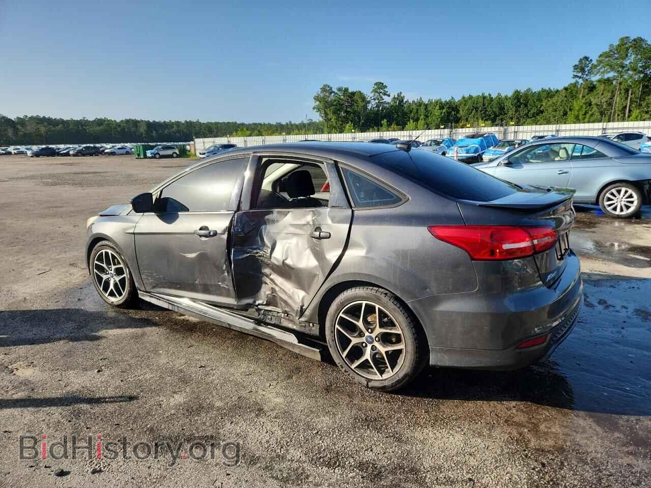 2016 FORD FOCUS - VIN: 1FADP3F20GL304743 - Фото 2