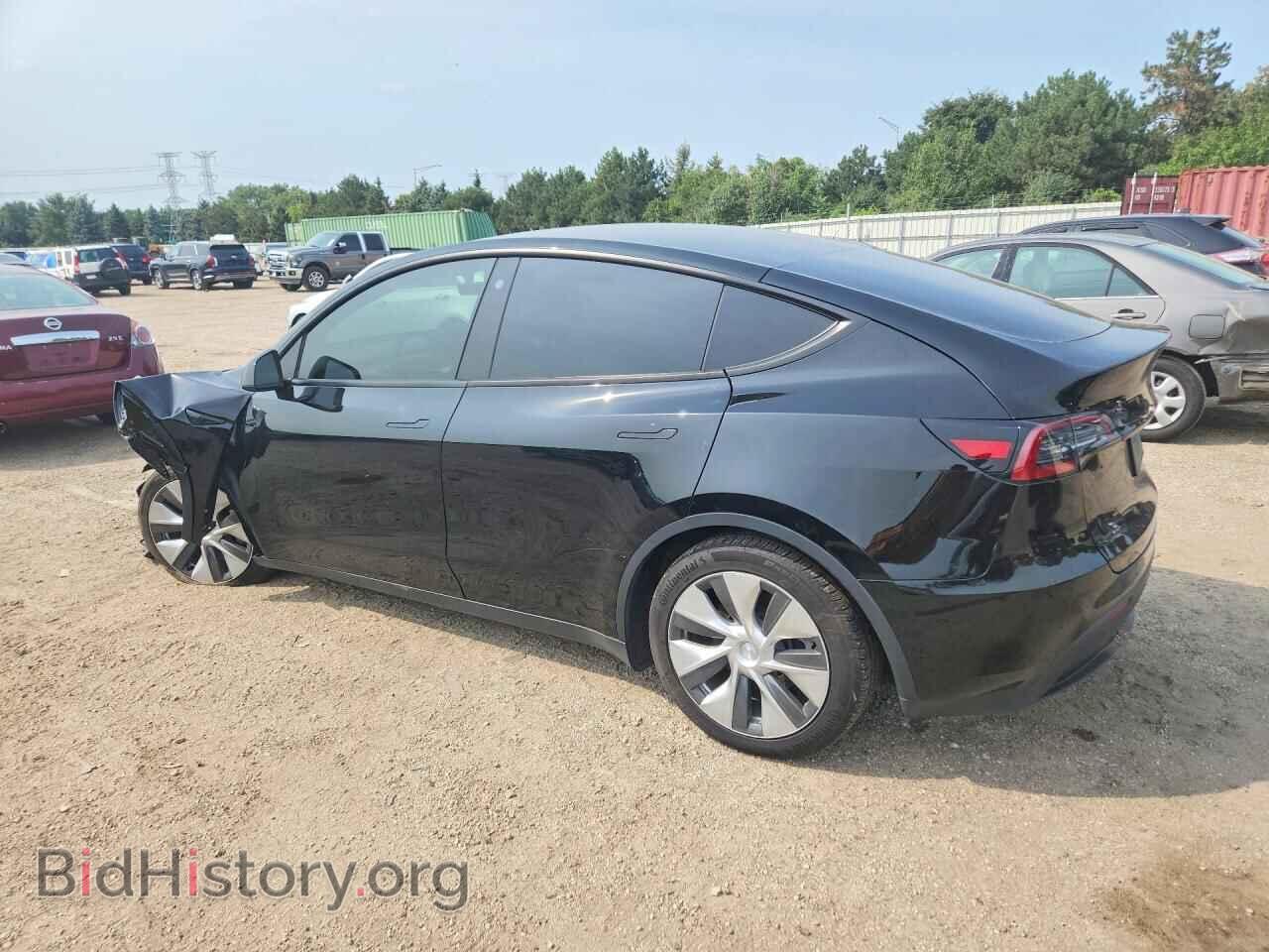 2023 TESLA MODEL Y - VIN: 7SAYGDEE2PF668455 - Photo 2