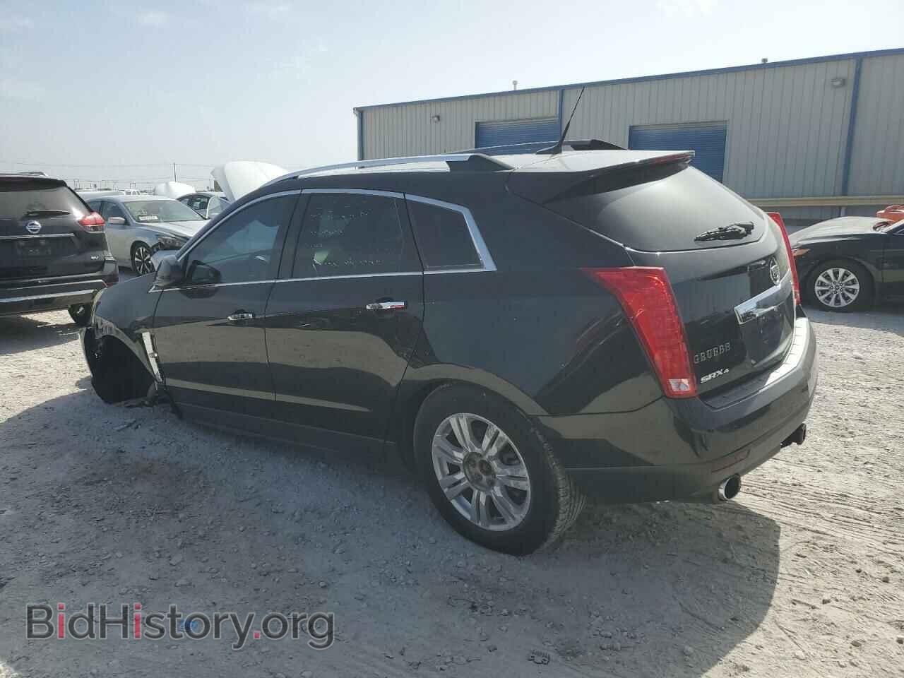 2012 CADILLAC SRX - VIN: 3GYFNDE38CS512134 - Фото 2