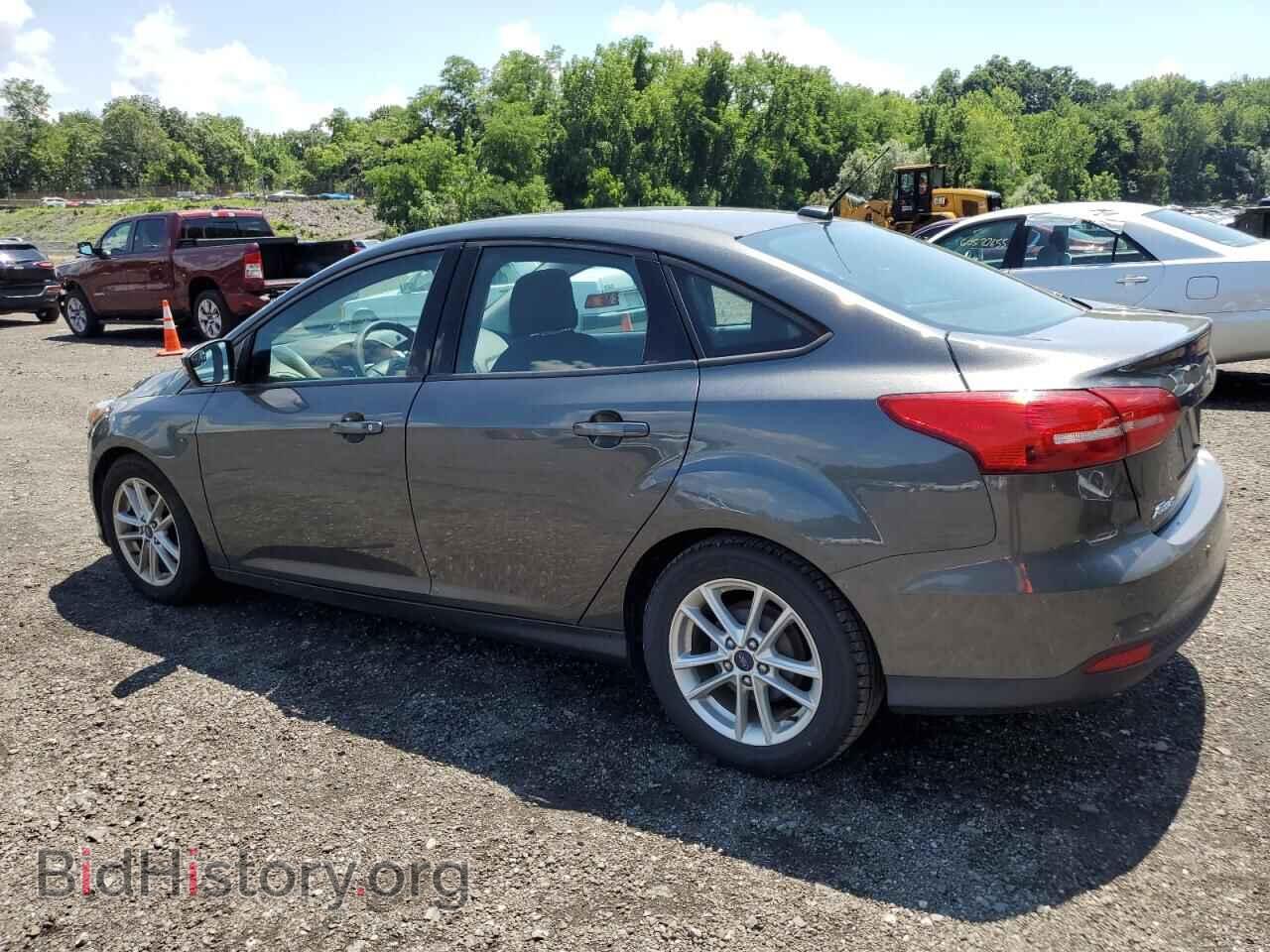 2016 FORD FOCUS - VIN: 1FADP3F22GL389102 - Фото 2