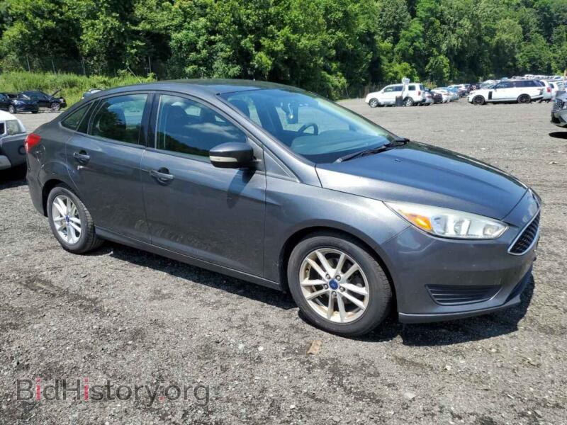 2016 Ford FOCUS (VIN 1FADP3F22GL389102) — фото 4 из 12