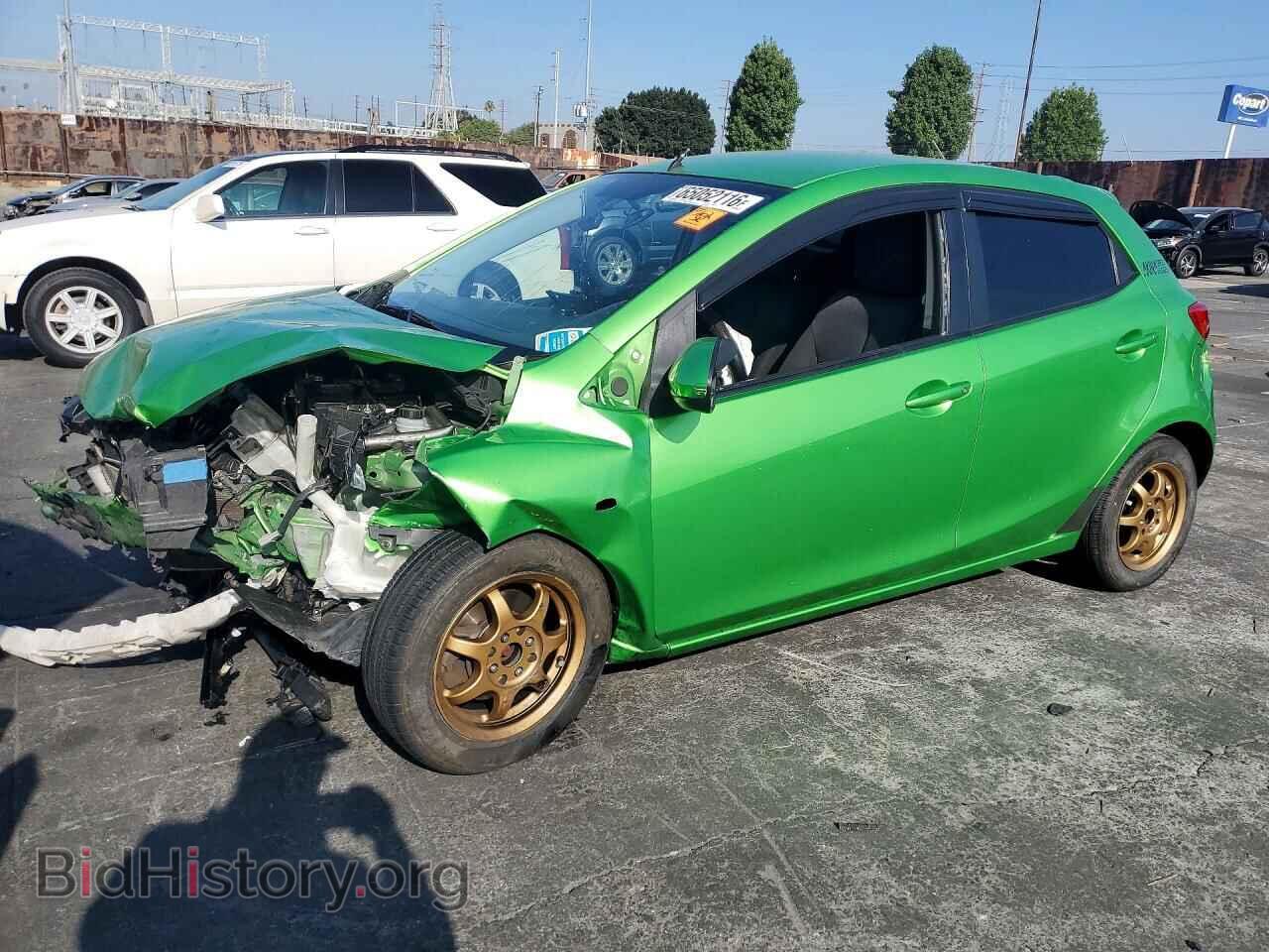 2011 Mazda 2 (VIN JM1DE1HZ6B0108038) — photo 1 of 13, Copart, damage: front end
