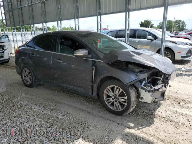 2012 Ford FOCUS (VIN 1FAHP3H24CL338564) — фото 4 из 13