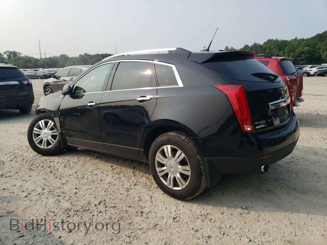 2014 CADILLAC SRX - VIN: 3GYFNEE32ES643679 - Фото 2