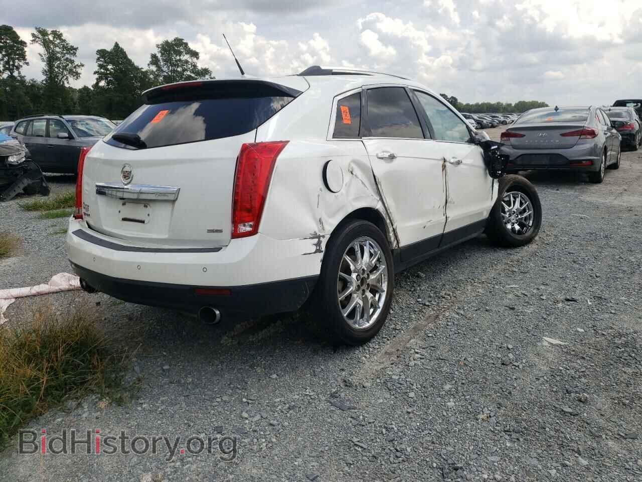 2014 CADILLAC SRX - VIN: 3GYFNCE37ES625439 - Фото 3