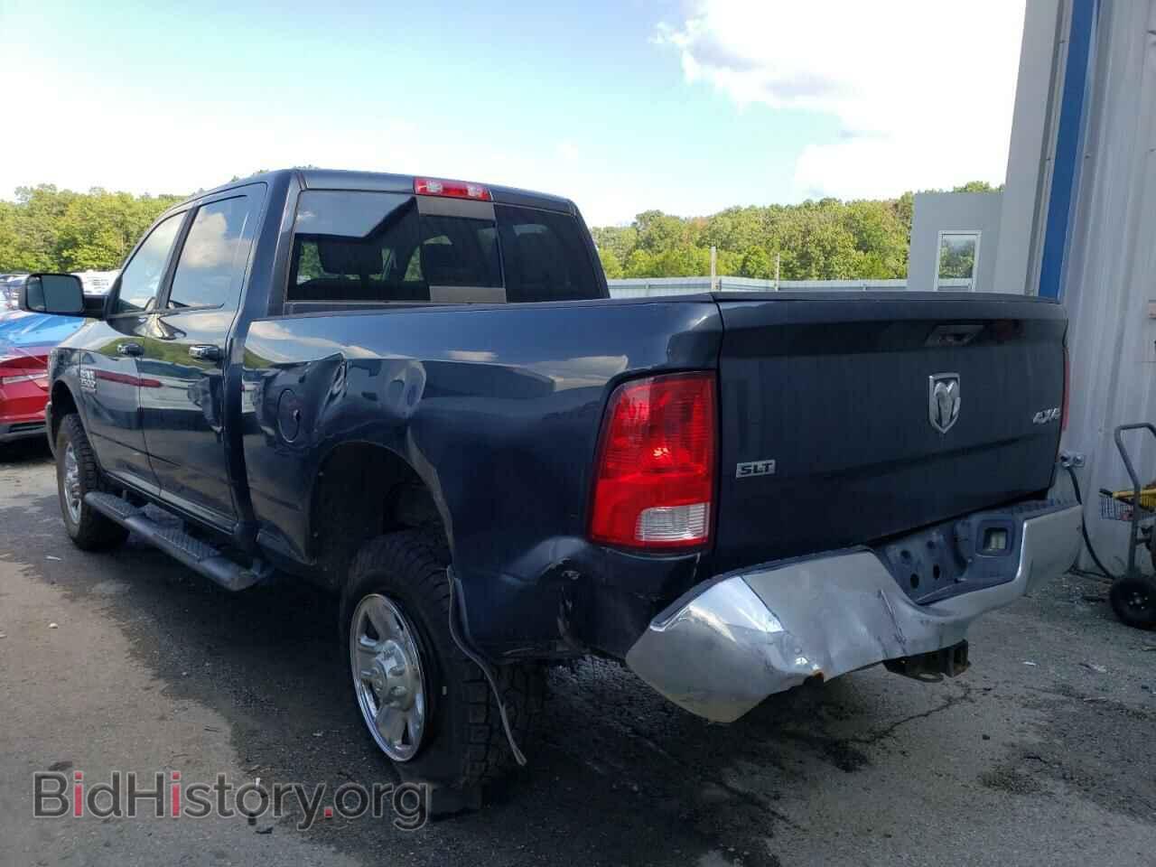 2014 RAM All Models - VIN: 3C6UR5DJ4EG142871 - Фото 2