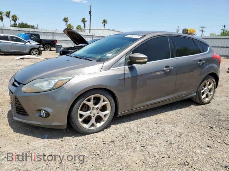 2012 Ford FOCUS Titanium (VIN 1FAHP3N21CL256943) — photo 1 of 12, Copart, damage: front end