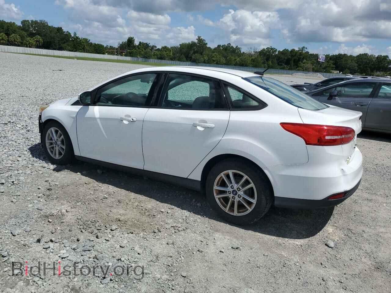 2016 FORD FOCUS - VIN: 1FADP3F22GL304677 - Фото 2