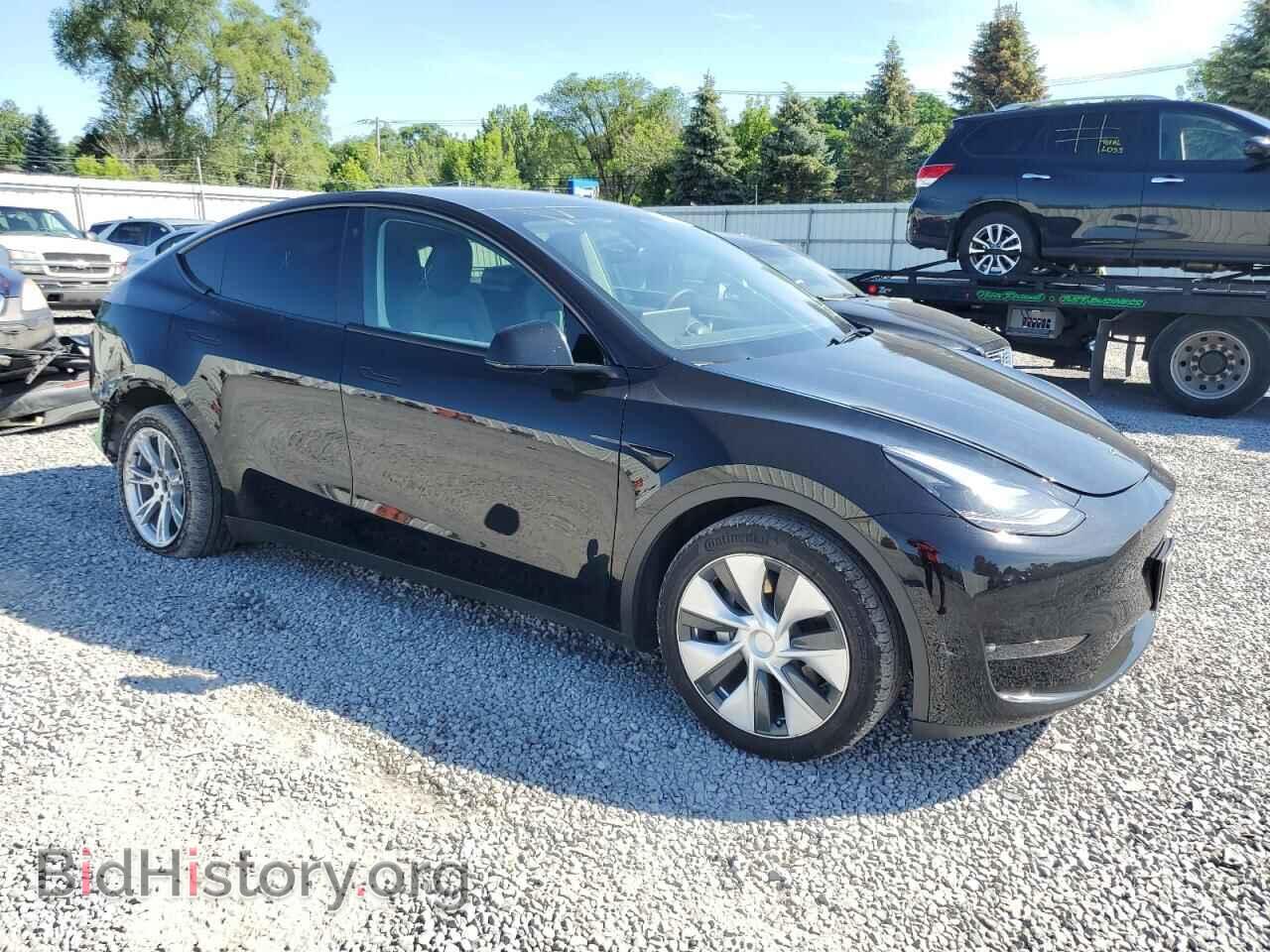 2023 TESLA MODEL Y - VIN: 7SAYGDEE0PF686257 - Photo 4