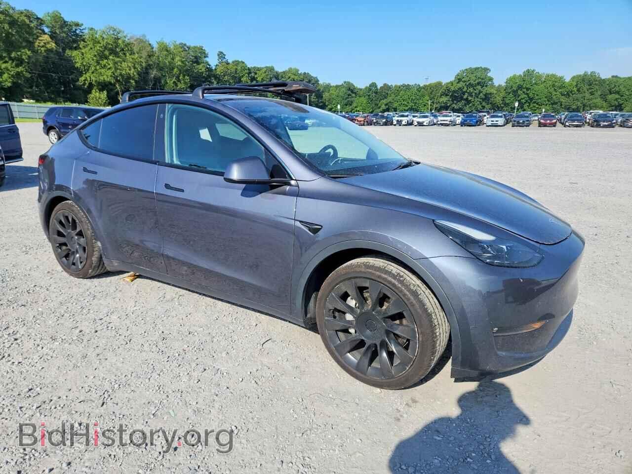 2023 TESLA MODEL Y - VIN: 7SAYGAEE7PF781557 - Photo 4