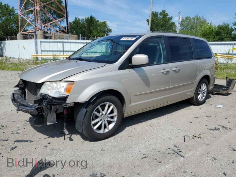 2014 Dodge CARAVAN SXT (VIN 2C4RDGCG9ER427543) — photo 1 of 14, Copart, damage: front end
