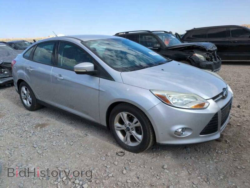2012 Ford FOCUS (VIN 1FAHP3F25CL329102) — photo 4 of 12