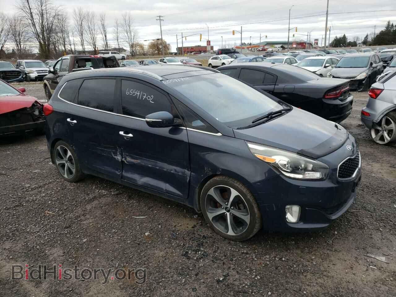 2014 KIA RONDO - VIN: KNAHU8A34E7040303 - Фото 4