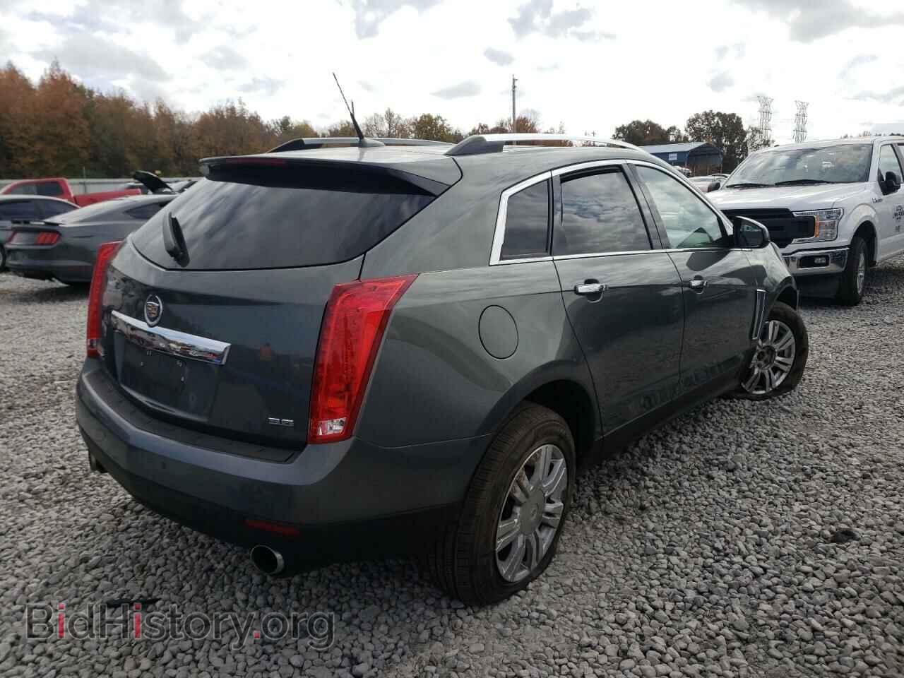 2013 CADILLAC SRX - VIN: 3GYFNCE35DS572030 - Фото 4