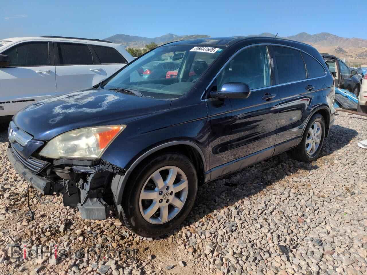 Photo JHLRE48707C001663 - HONDA CRV 2007