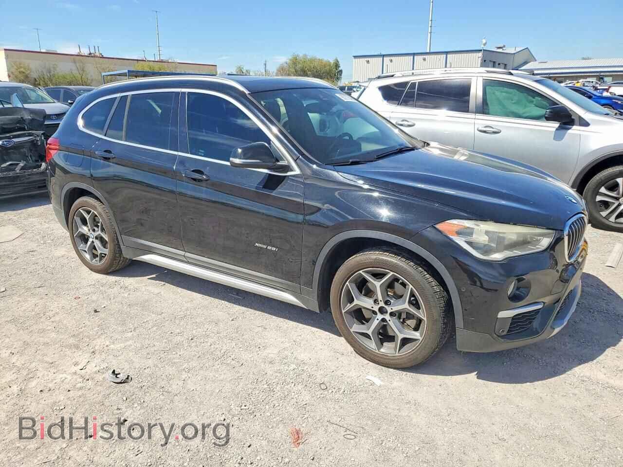 2016 BMW X1 - VIN: WBXHT3C34GP888564 - Photo 4