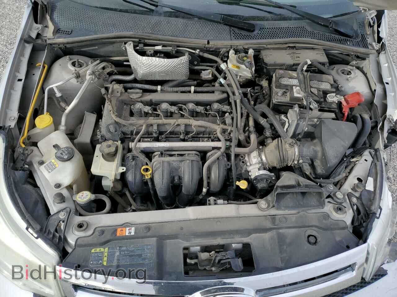 2009 FORD FOCUS - VIN: 1FAHP36N09W258411 - Фото 7