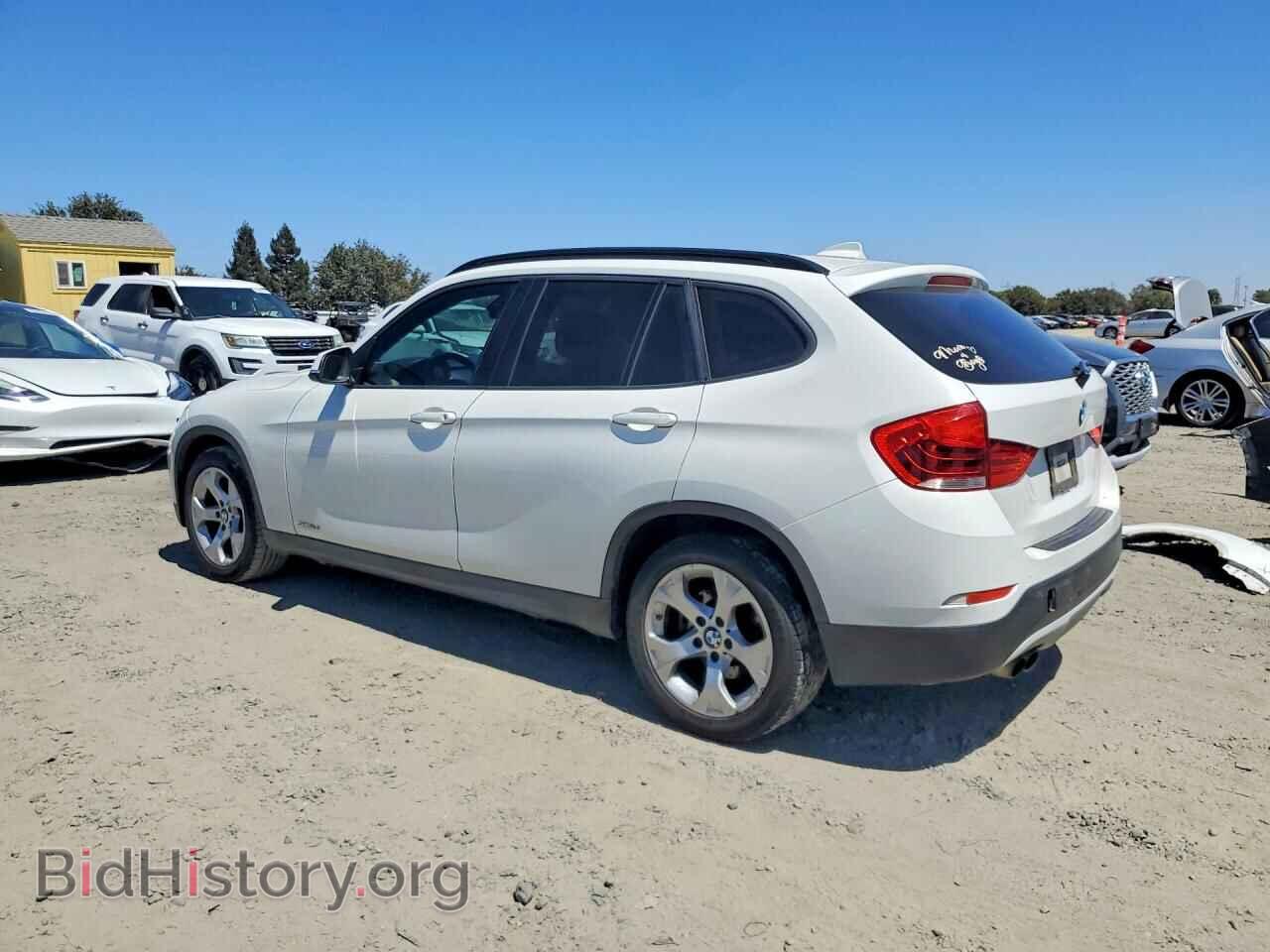 2014 BMW X1 - VIN: WBAVM1C50EVW52163 - Фото 2