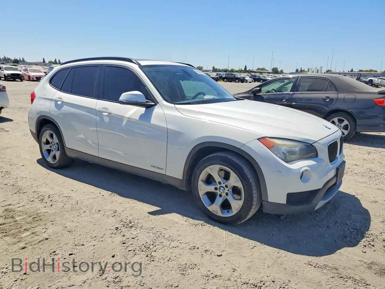 2014 BMW X1 - VIN: WBAVM1C50EVW52163 - Фото 4