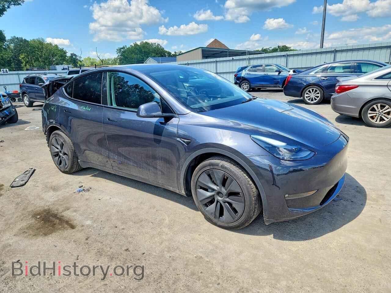 2025 TESLA MODEL Y - VIN: 7SAYGAEE2SF232597 - Photo 4