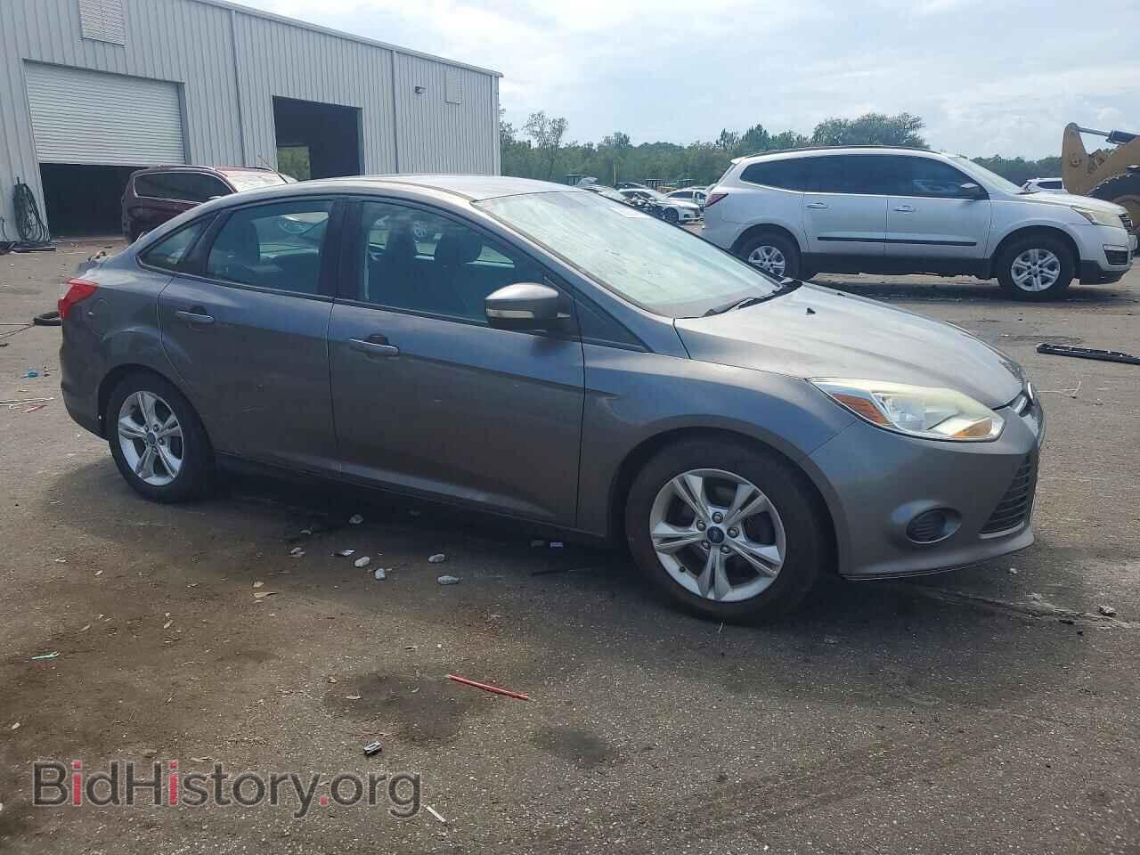 2014 FORD FOCUS - VIN: 1FADP3F20EL22834X - Photo 4