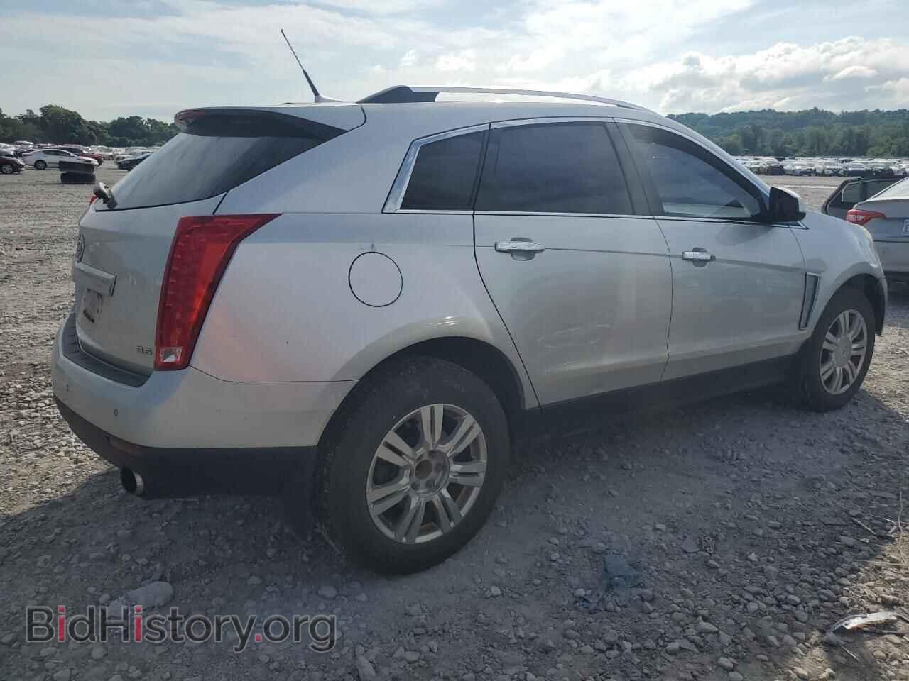 2013 CADILLAC SRX - VIN: 3GYFNCE3XDS596033 - Фото 3