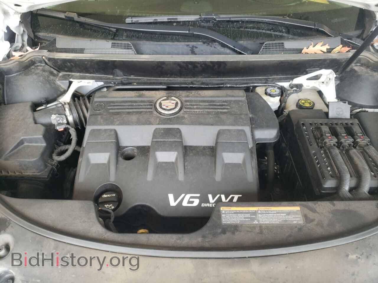 2014 CADILLAC SRX - VIN: 3GYFNDE33ES636492 - Фото 7
