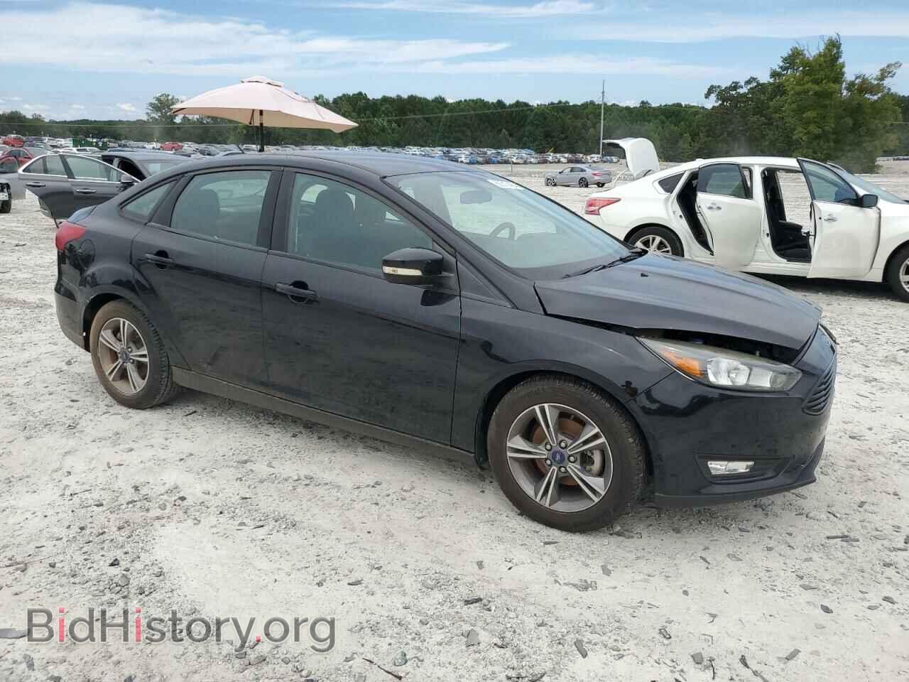 2017 FORD FOCUS - VIN: 1FADP3FE0HL307847 - Photo 4