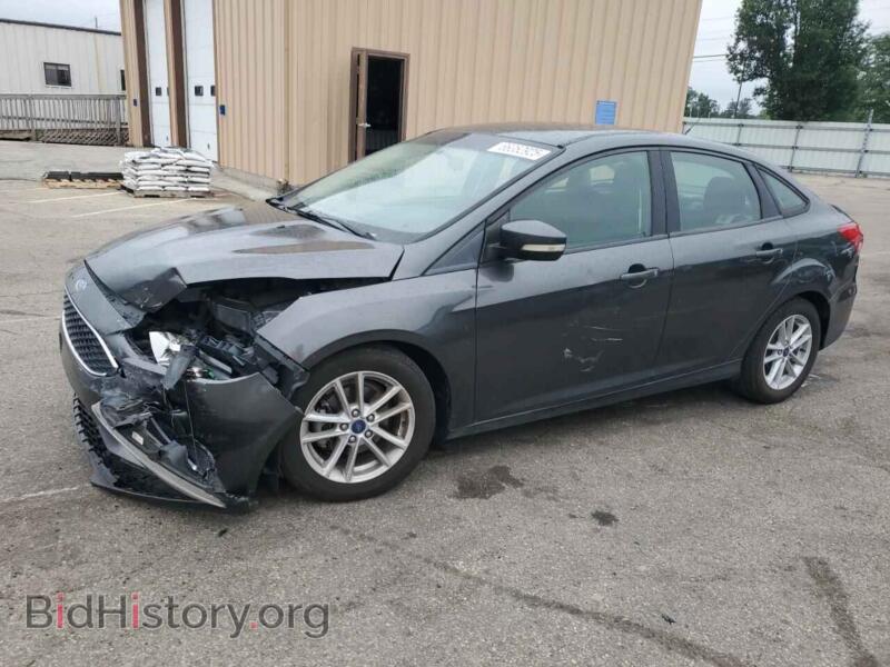 2017 Ford FOCUS SE (VIN 1FADP3F2XHL317520) — фото 1 из 12, Copart, повреждение: передняя часть