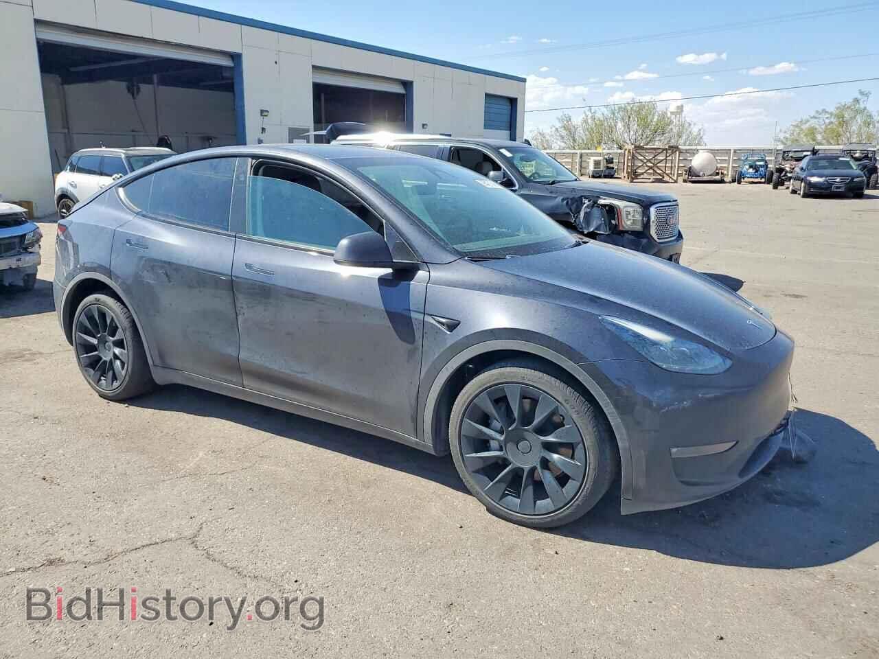 2024 TESLA MODEL Y - VIN: 7SAYGAEE2RF068004 - Photo 4