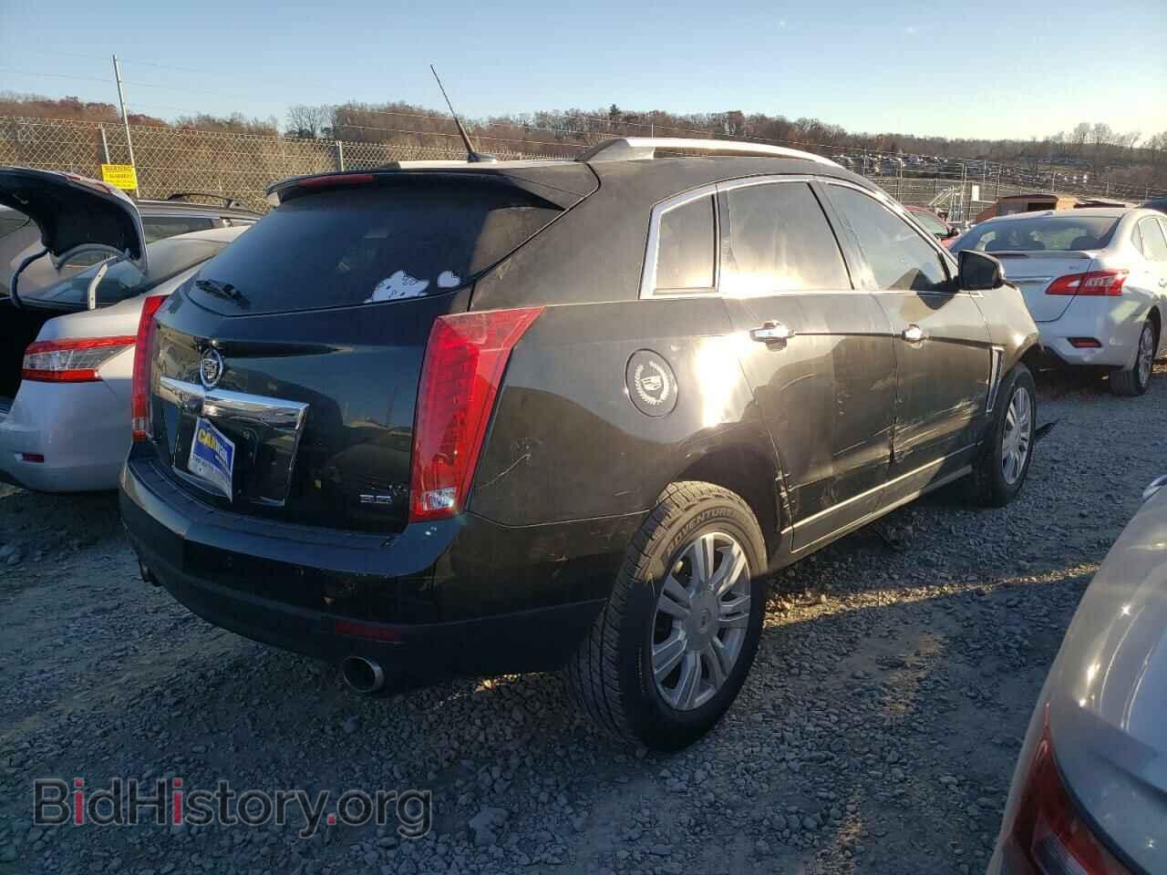 2014 CADILLAC SRX - VIN: 3GYFNEE30ES687034 - Фото 4